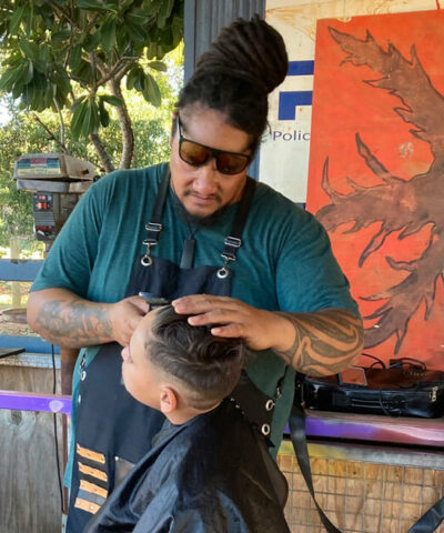 Boy getting a haircut.